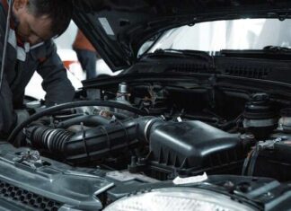 5 Signs Your EGR Valve Needs Cleaning or Replacement man working under car bonnet