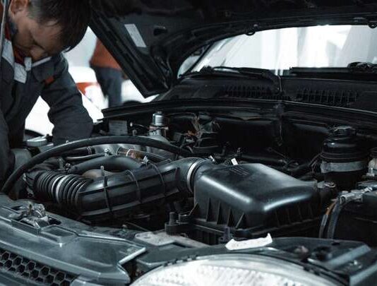 5 Signs Your EGR Valve Needs Cleaning or Replacement man working under car bonnet