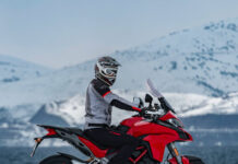 Winter Wheels: 3 Unforgettable UK Motorcycle Trips for the Holidays motorbike in the mountains